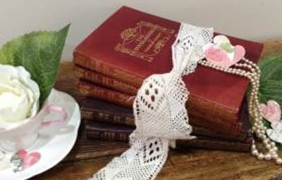 books pearls cup saucer confetti