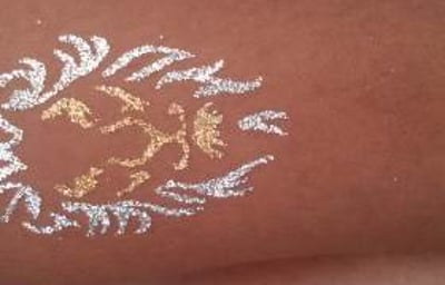 Lion glitter tattoo