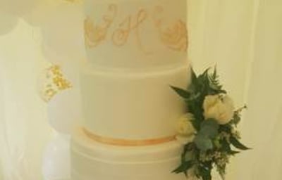 Elegant 4 tier wedding cake by a Cambridge cake designer 