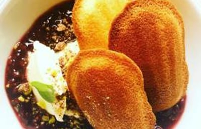 Almond madeleines with raspberry compote and citrus creme fraiche