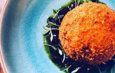 chorizo quail egg with onion relish  