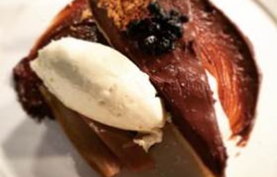 salted chocolate tart with clotted cream and hazelnut granola 