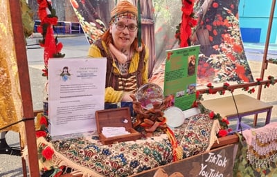 Festival booth with bright fortune teller theme