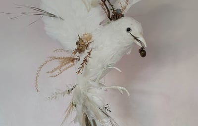 Handmade bird using dried flowers