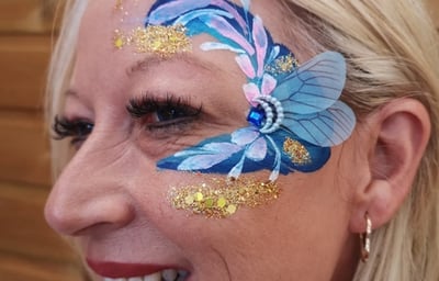 Adult facepaint with handmade bling