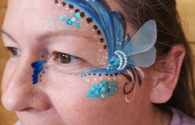 Adult facepaint with handmade bling