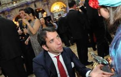 Amelie Appleby entertains with palm readings at Corporate Events