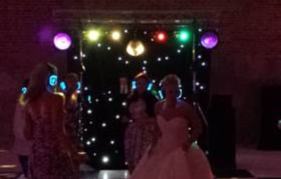 Black Gold Rig with mirrorball, Starcloth backdrop and uplighters (night time)