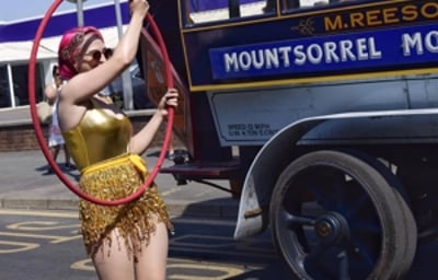 Chicas Locas Burlesque Hula hooping in parade
