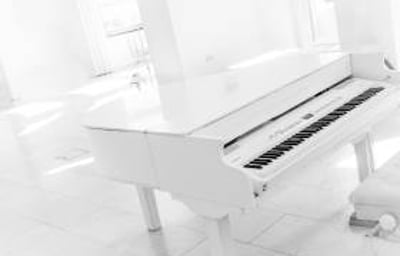White Baby Grand Piano