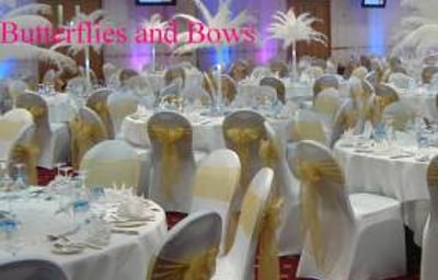 Full Set Up With Postrich Centres, Uplighters, Chair Covers Etc