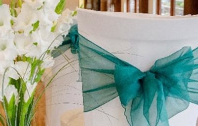 gladioli vases and chair covers