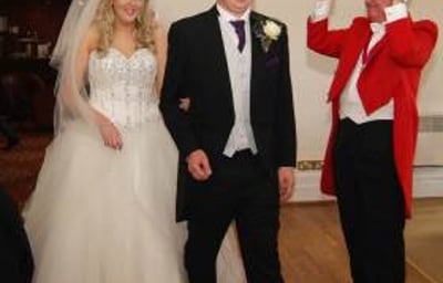 The Bride and Groom Enter Their Wedding Breakfast to Great Applause