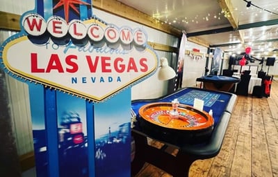 Roulette Blackjack tables Vegas logo