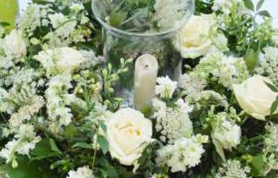 white hurricane vase table centre