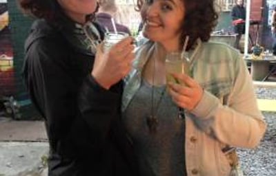 Happy customers sipping on floral summery cocktails!