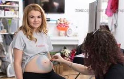Baby bump painting available for the mum-to-be.