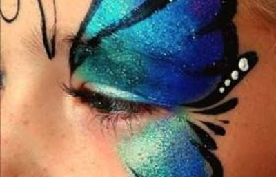 Face painting single eye butterfly