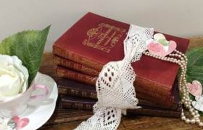 books pearls cup saucer confetti