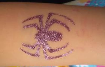 Spider glitter tattoo