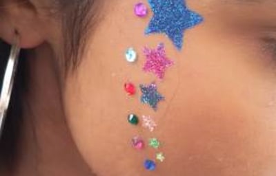 Stars glitter tattoo with gems