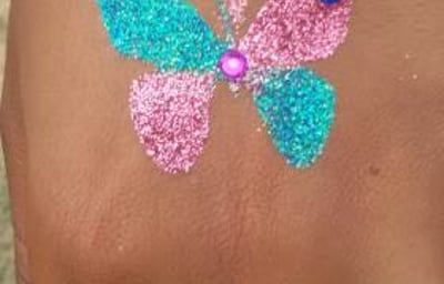 Butterfly glitter tattoo with gems