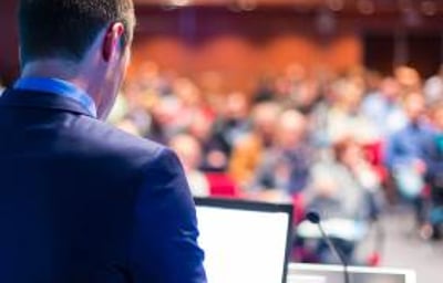 bigstock-Speaker-at-Business-Conference-64962394