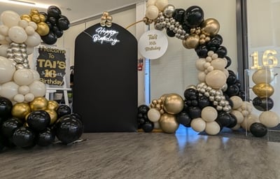 black and gold sailboard and hoop.jpg