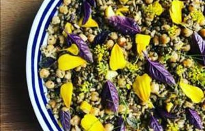 five rice salad with edible flowers and fennel top
