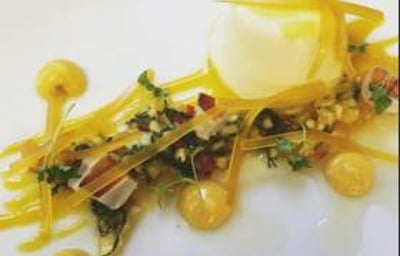 Lychee panna cotta with mango and passionfruit salsa