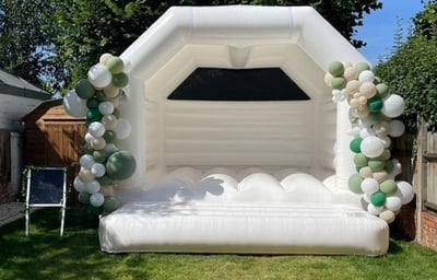 white bounchy castle 2 cheeky events