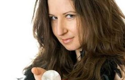 Amelie Appleby mingles amongst guests with her crystal ball