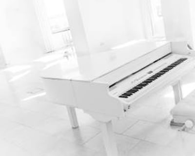 White Baby Grand Piano