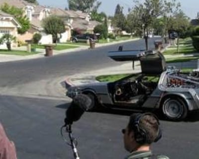 The BTTF Car being filmed on original movie loaction by Universal Studios