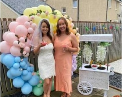 Balloon hoop and champagne cart