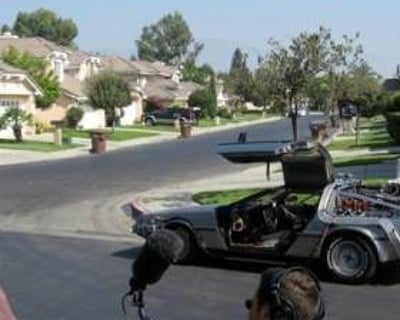 The BTTF Car being filmed on original movie loaction by Universal Studios